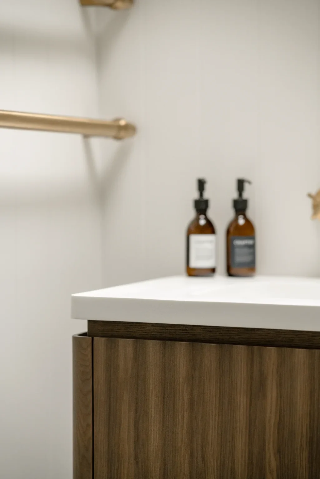 Modern bathroom with wooden cabinet and toiletries