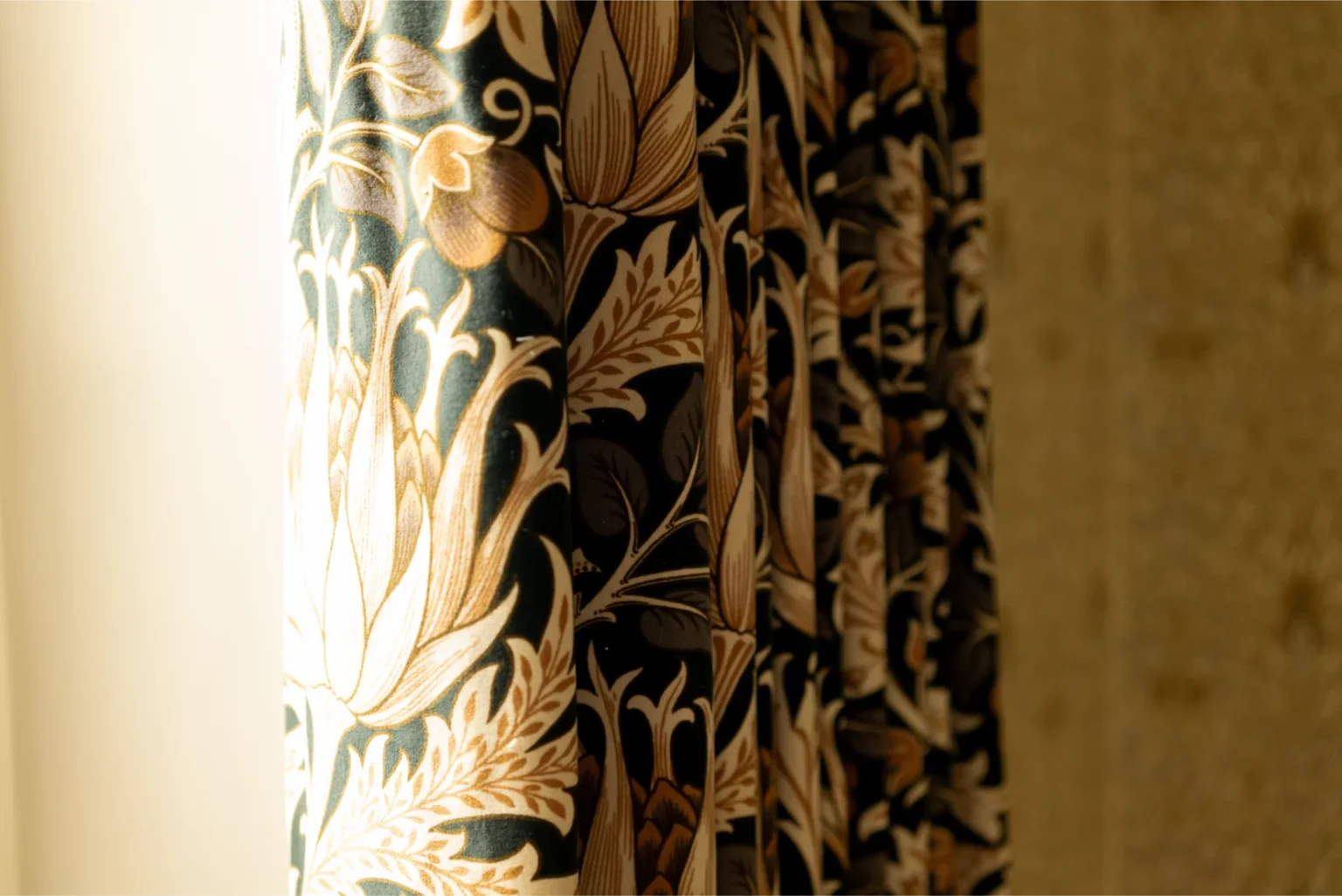Closeup of patterned floral curtains