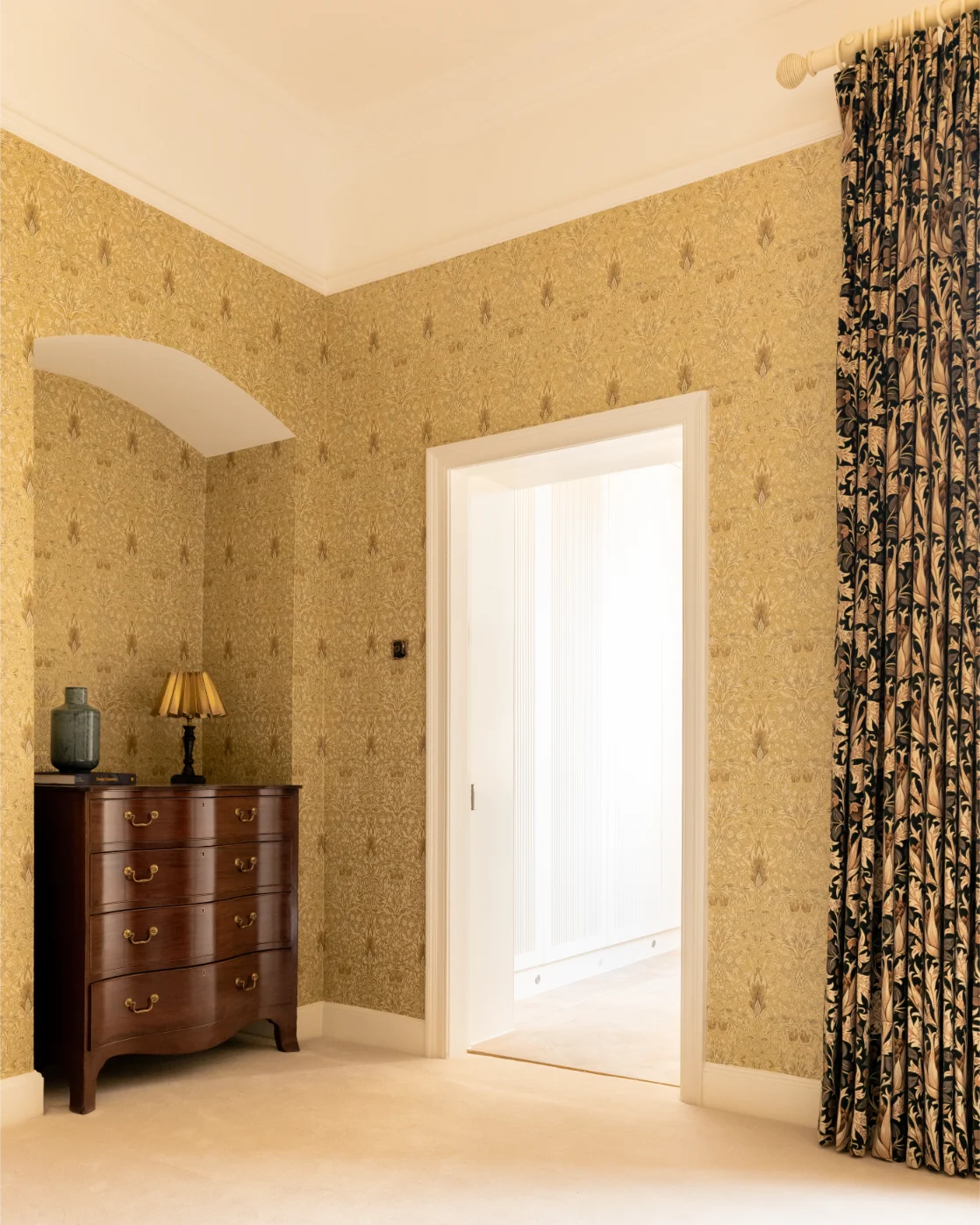 Vintage room with dresser and wallpaper
