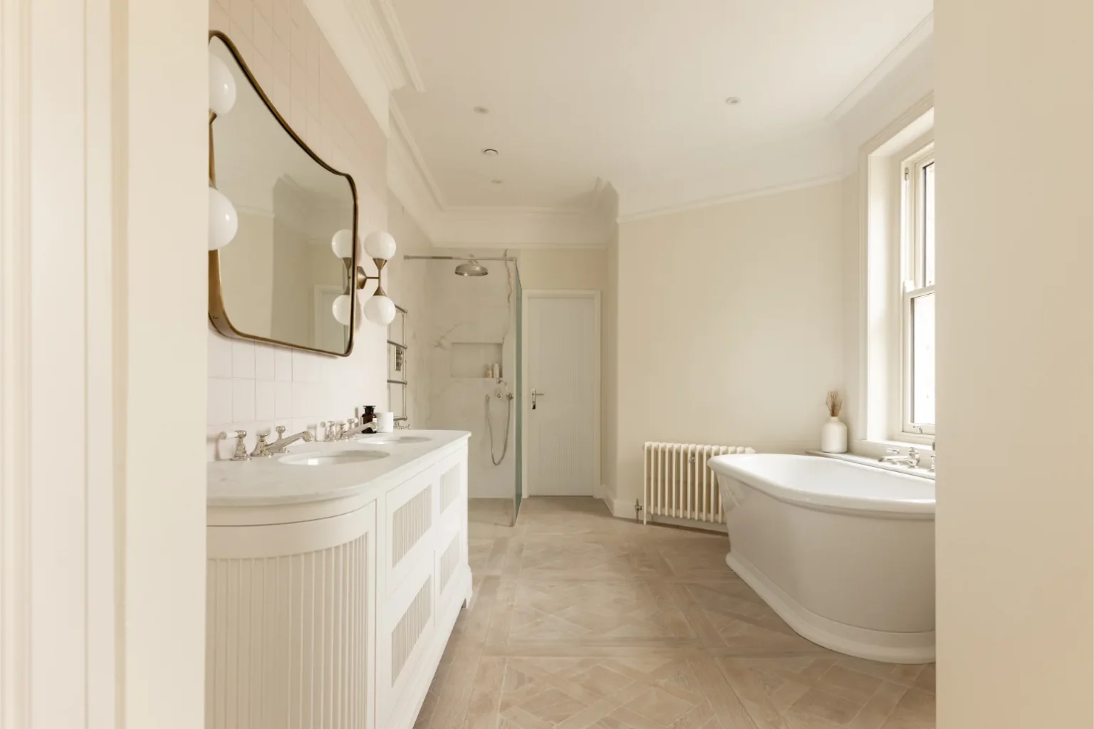 Elegant white bathroom with bathtub and shower