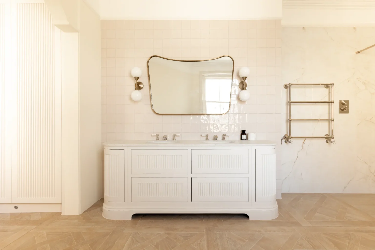 Elegant bathroom with large mirror and modern fixtures